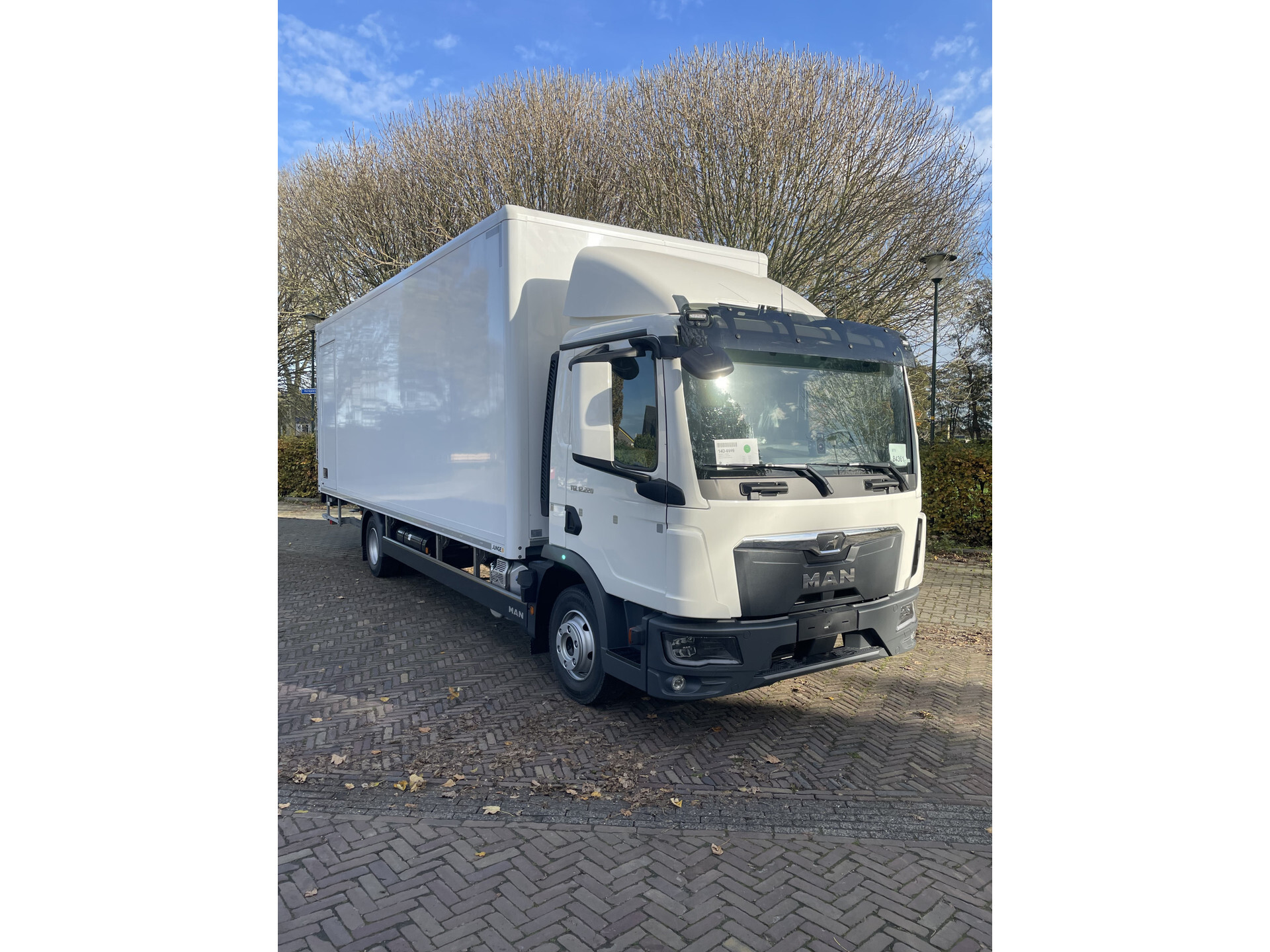 MAN TGL 12.220 4x2 BL CH met Junge gesloten laadbak en laadklep